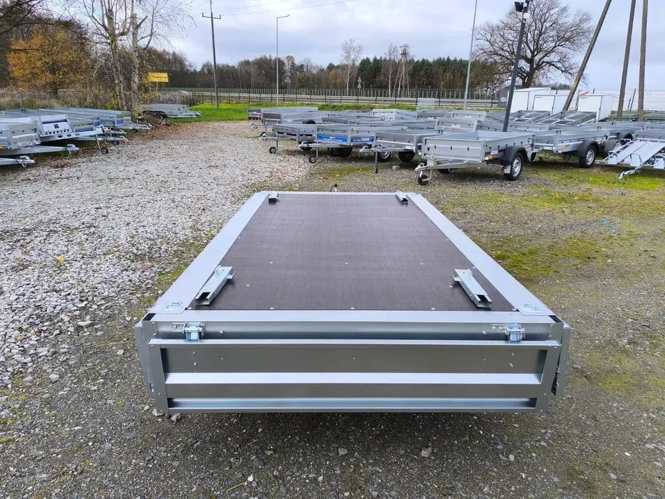 Neptun Przyczepa Neptun N7-263 2 KPS BASELINE 263x145x30 2 osie 750 kg koła pod spodem platforma Nowa przyczepa Neptun 263x145x30 2 osie DMC 750kg Częstochowa dostawa – zdjęcie 5