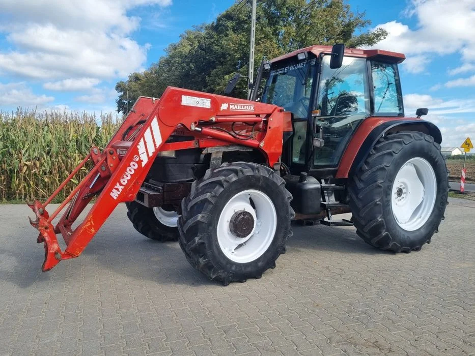 New Holland M100 z turem (TM, 8160)