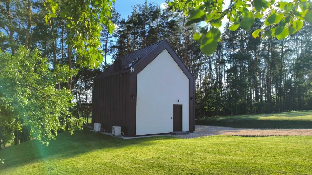 Domek z jacuzzi nad wodą Wschód&Zachód – zdjęcie 4