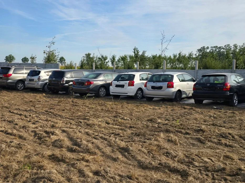 Toyota Corolla E12 chlapacz lewy przód – zdjęcie 5