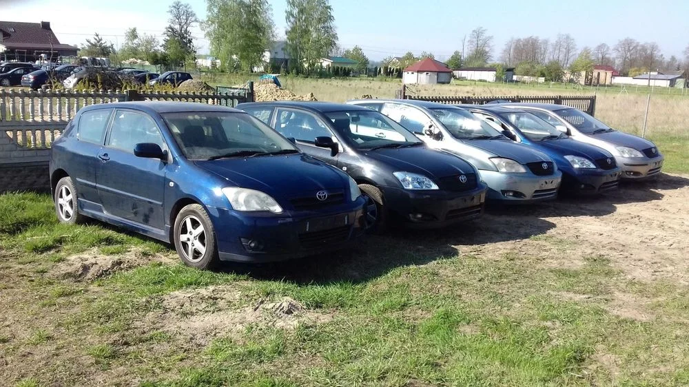Toyota Corolla E12 chlapacz lewy przód – zdjęcie 4