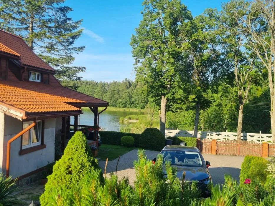Agroturystyka Nad Jeziorkiem noclegi nad jeziorem Mazury Mikołajki - ryby - łódka - pomost