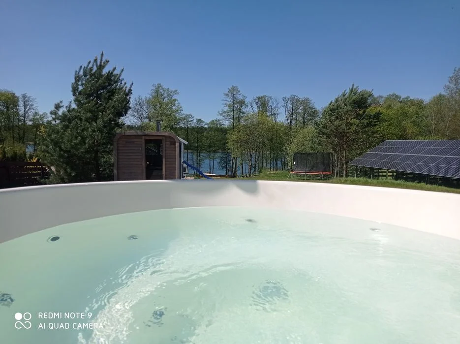 Całoroczny dom nad jeziorem SEN MAZUR z sauną, jacuzzi ,własną plażą