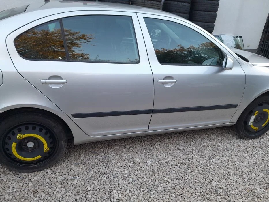 Drzwi lewe prawe przód tył LF7T HB skoda octavia II