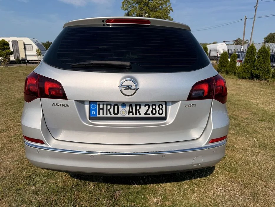 Opel Astra Pierwszy właściciel , serwisowany, bi xenon , nawigacja, parktronik – zdjęcie 4