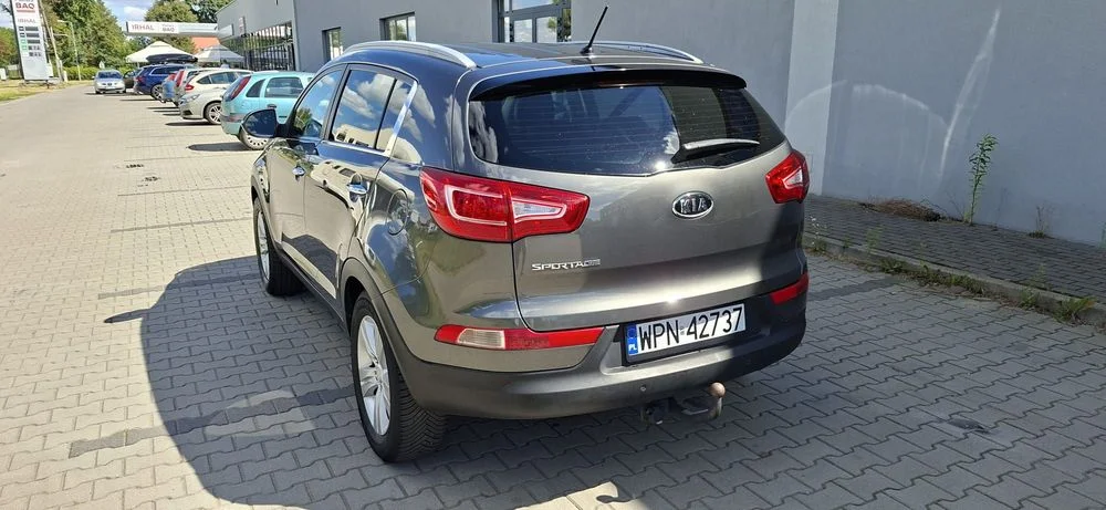 Kia Sportage 2.0b 163KM Serwis Klima Alu Ledy Półskóra Niski Przebieg – zdjęcie 5