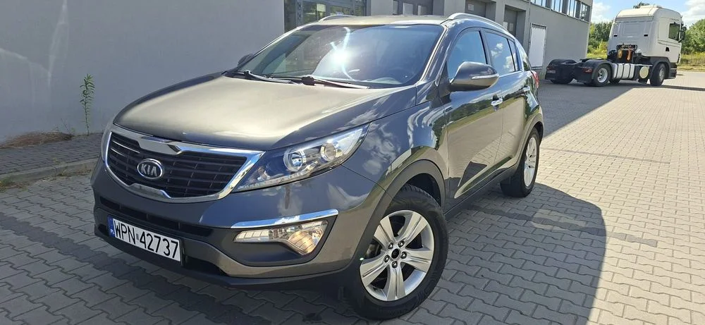 Kia Sportage 2.0b 163KM Serwis Klima Alu Ledy Półskóra Niski Przebieg – zdjęcie 3