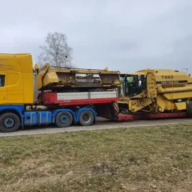 Transport maszyn ciągników koparek kombajnów domków holenderskich